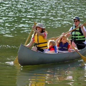 depositphotos_13786337-stock-photo-family-canoeing-at-lake